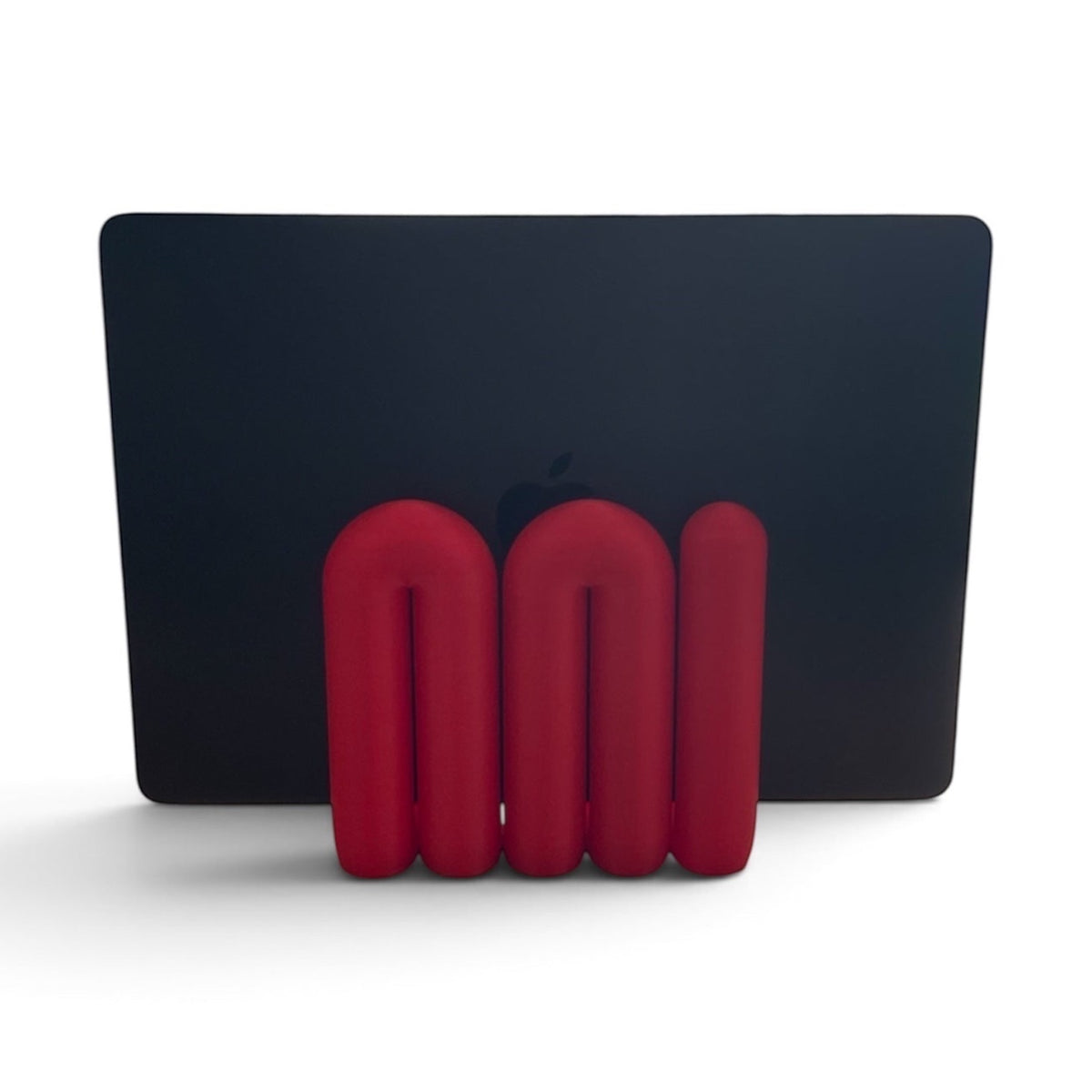 Support vertical pour ordinateur portable JN CREATIONS au design organique rouge vif sur fond blanc